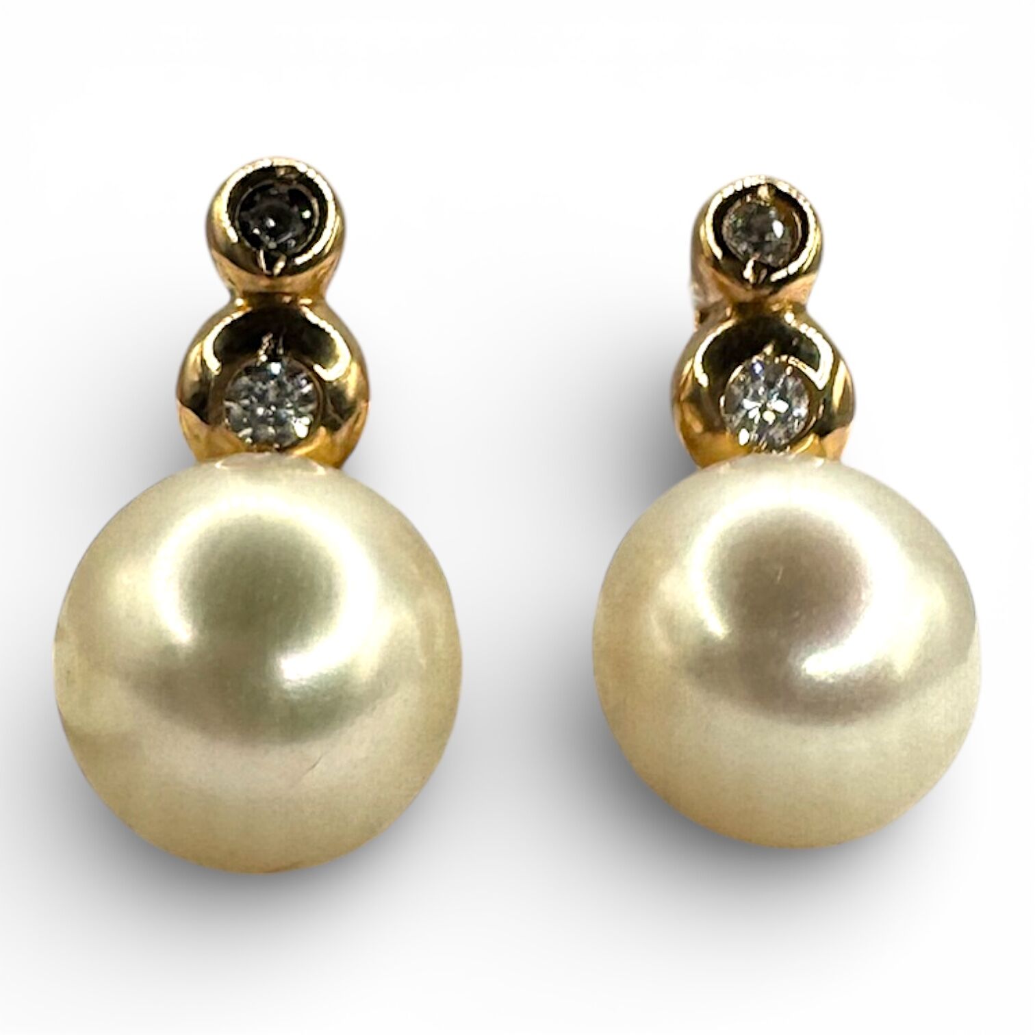 Золоті сережки з перлами