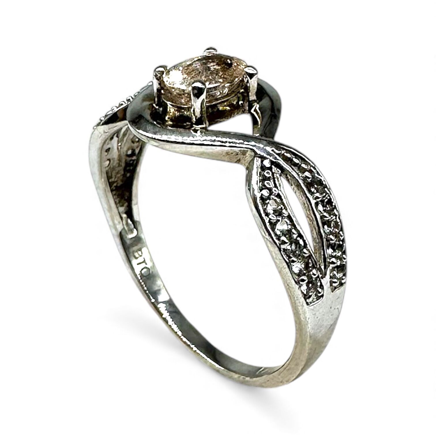 Срібна каблучка  з бразильським морганітом та топазами