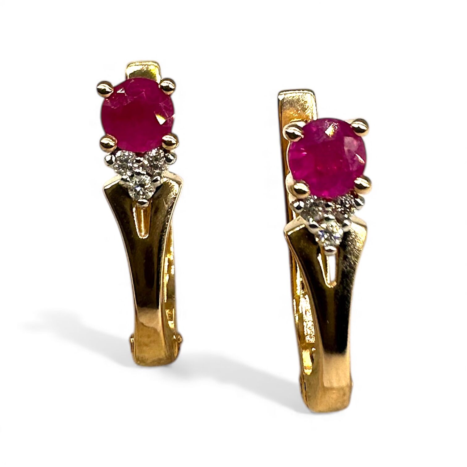Золоті сережки з рубінами